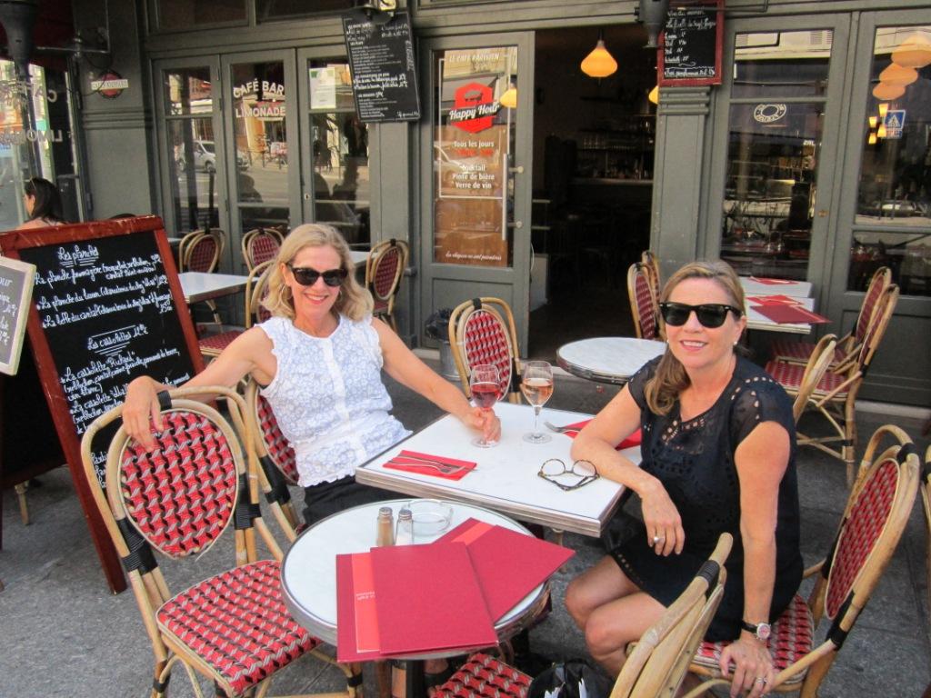 Nan sitting at cafe in Paris